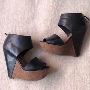 Steven black wedges